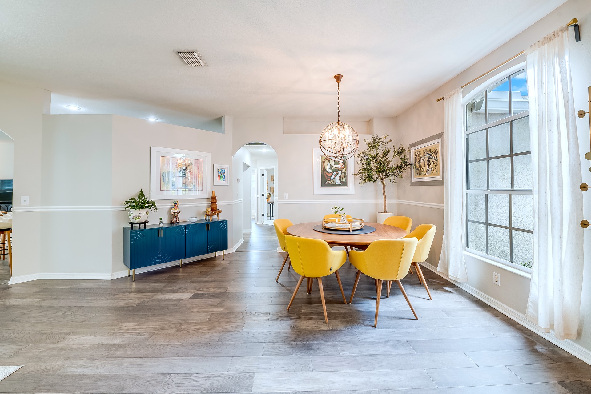 Bright living room with contemporary art in a Tampa Bay, FL home