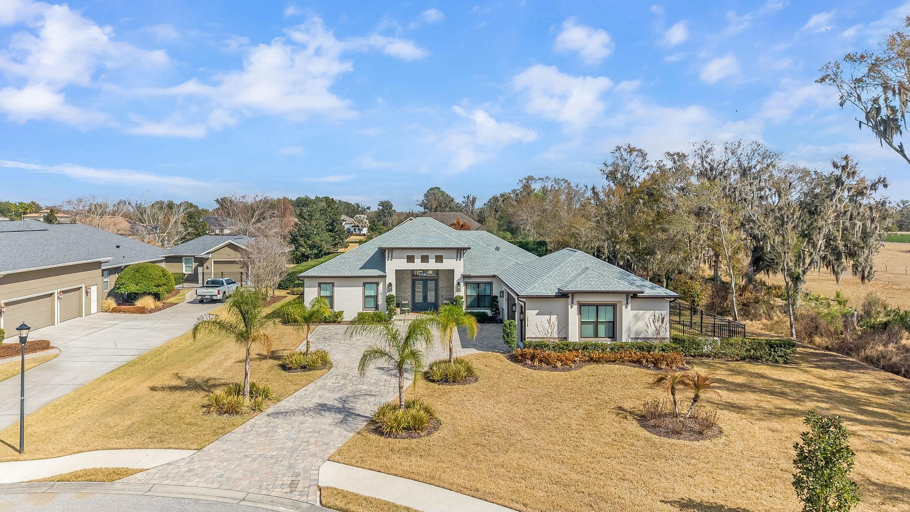Aerial drone photo of a property in Land O' Lakes, FL