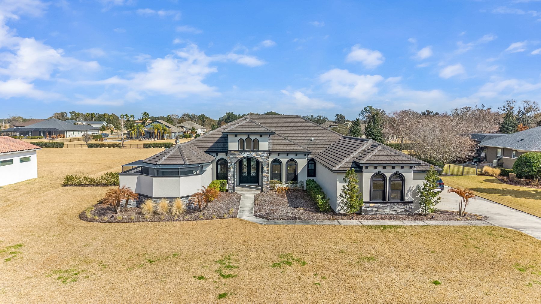 Aerial drone photo of a property in Land O' Lakes, FL