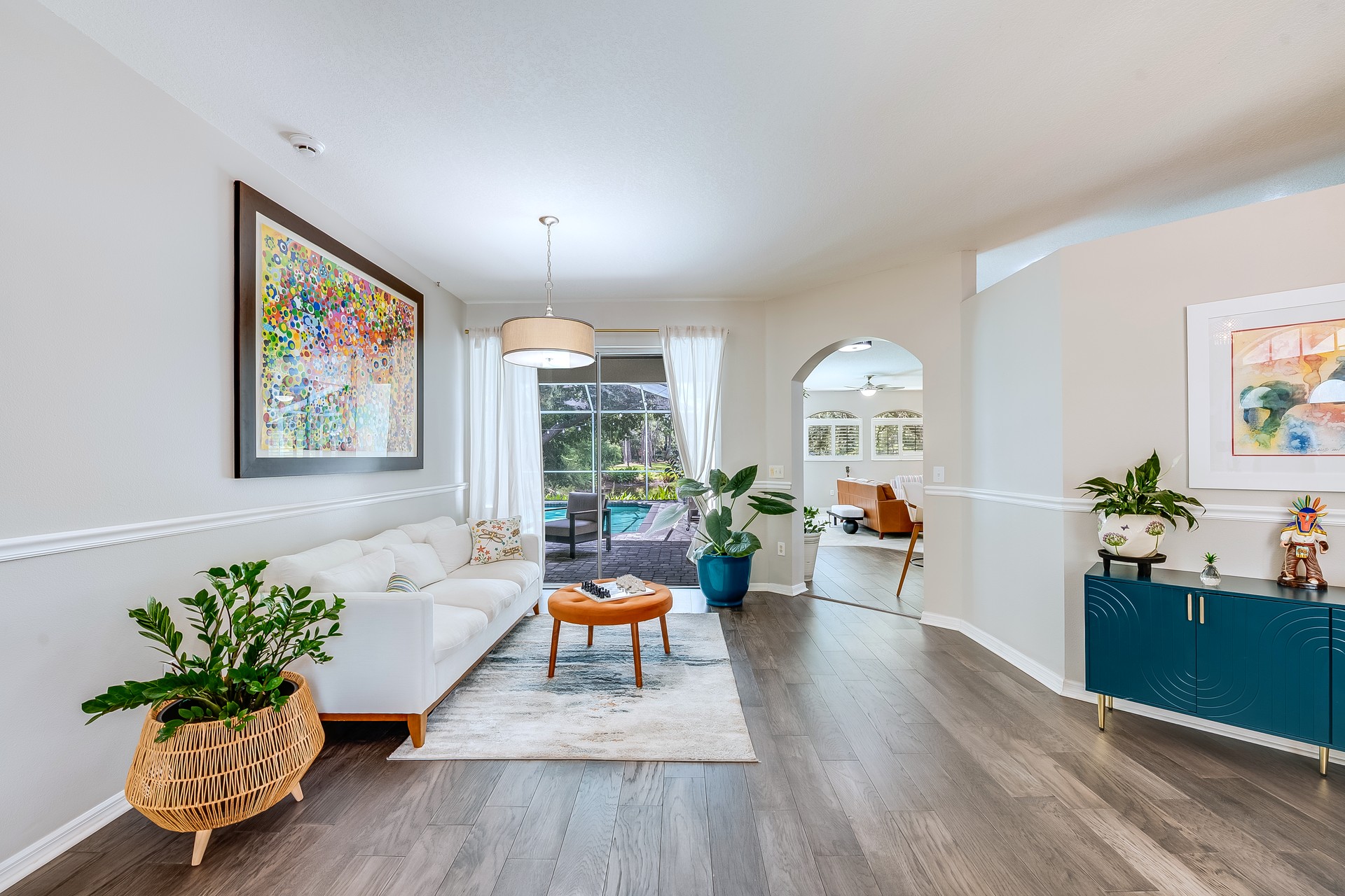 Living room opening to a pool in a Tampa Bay, FL home