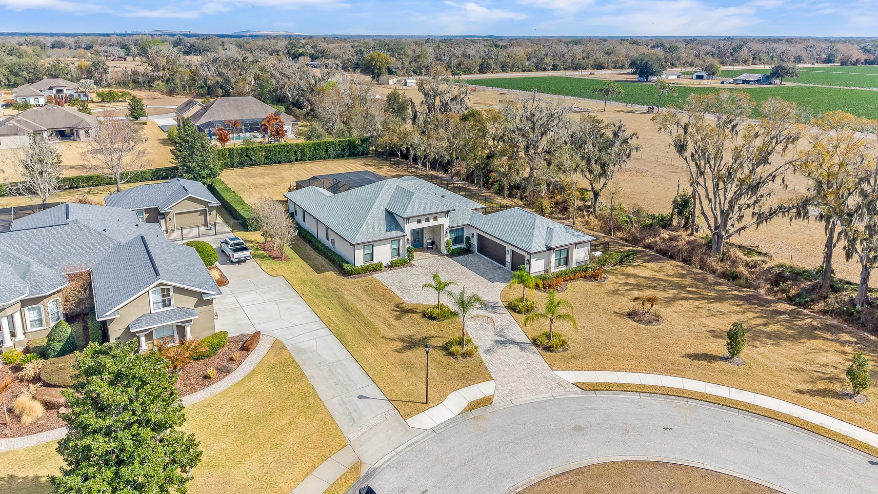 Aerial drone photo of a property in Land O' Lakes, FL