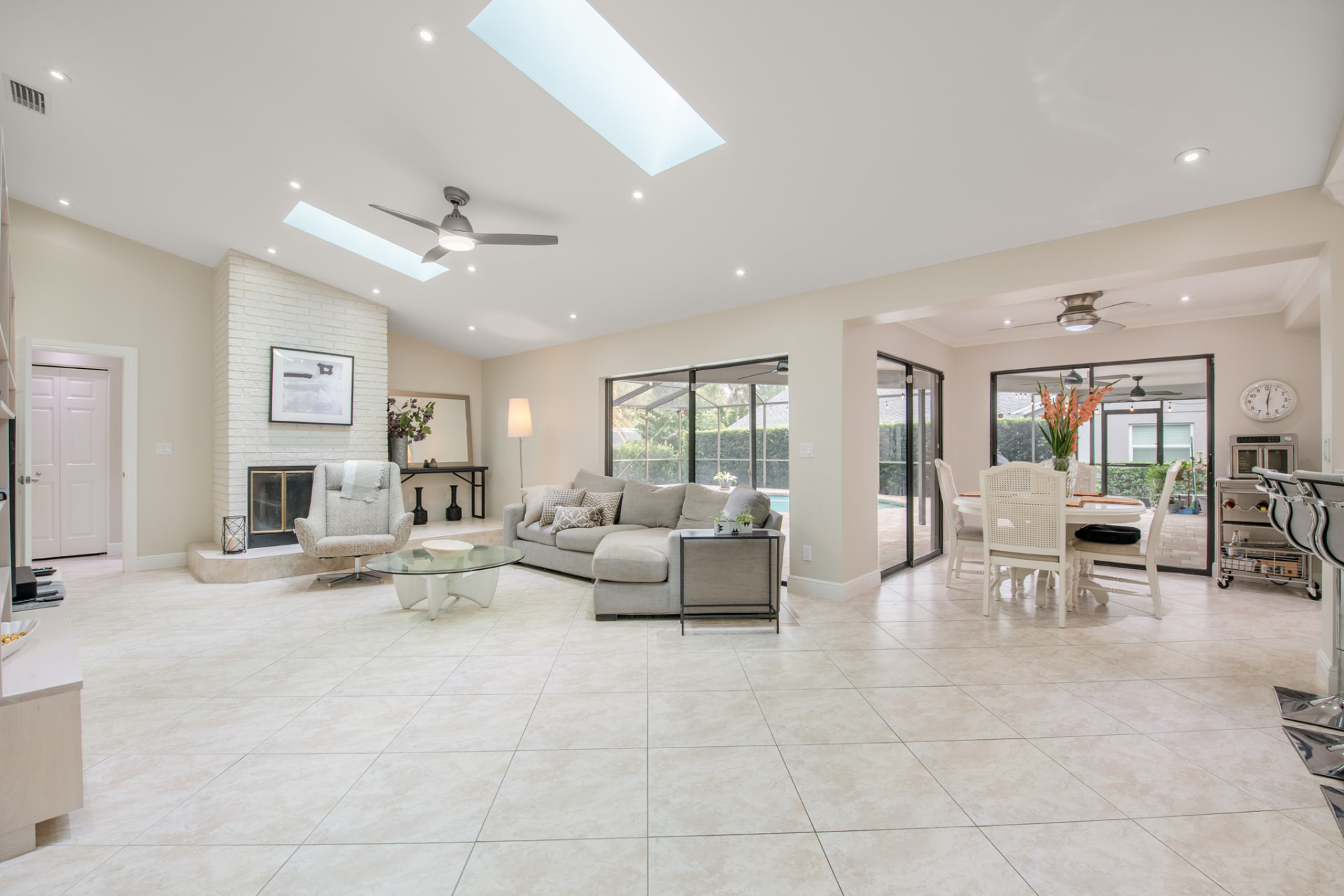 Open living and dining area with fireplace in a Palm Harbor, FL home